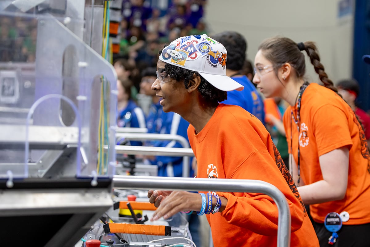 FIRST Robotics Competition student driving robot at FIRST Championship