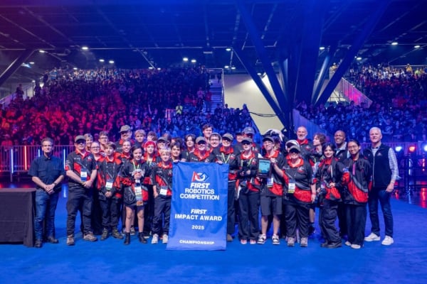 A photo of the 2025 FIRST Impact Award winning team